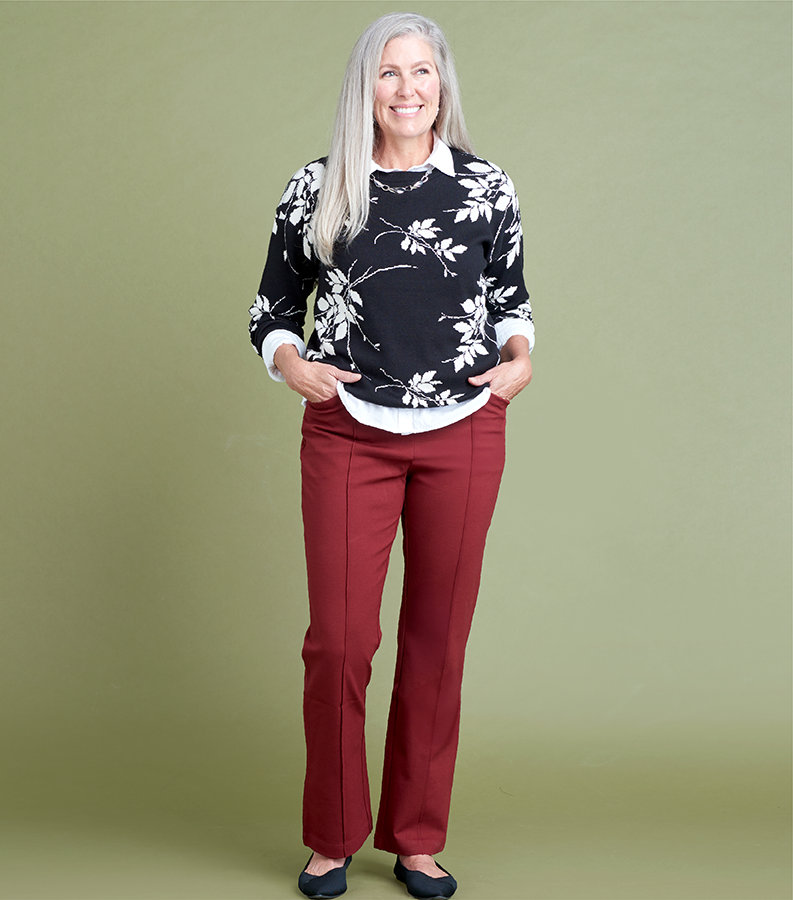 Comfort Meets Confidence. Featuring a red ponte pant and botanical sweater!