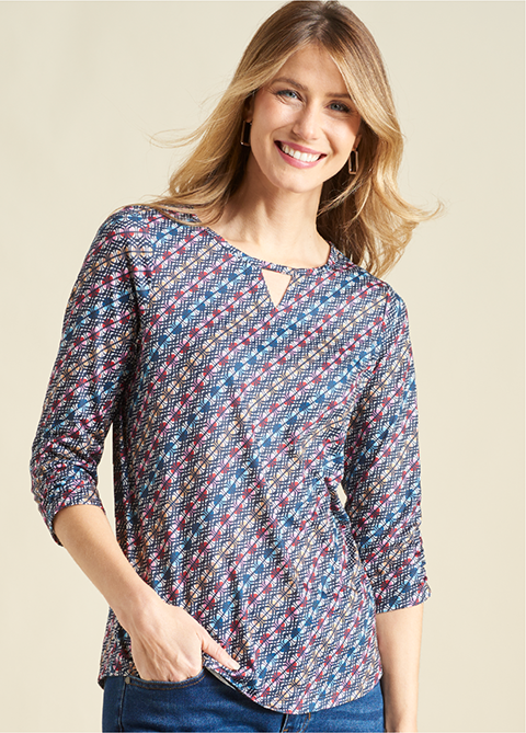 Explore our new arrivals! Featuring a blue diagonal geo print tee.