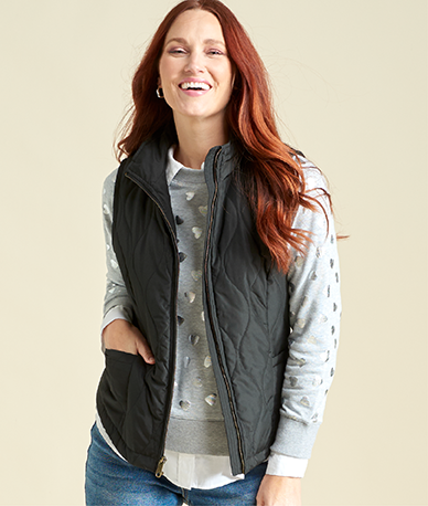 Explore our vests! Featuring a black quilted vest.