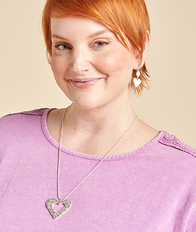 Explore our jewelry! Featuring a silver heart pendant necklace and silver heart dangle earrings.