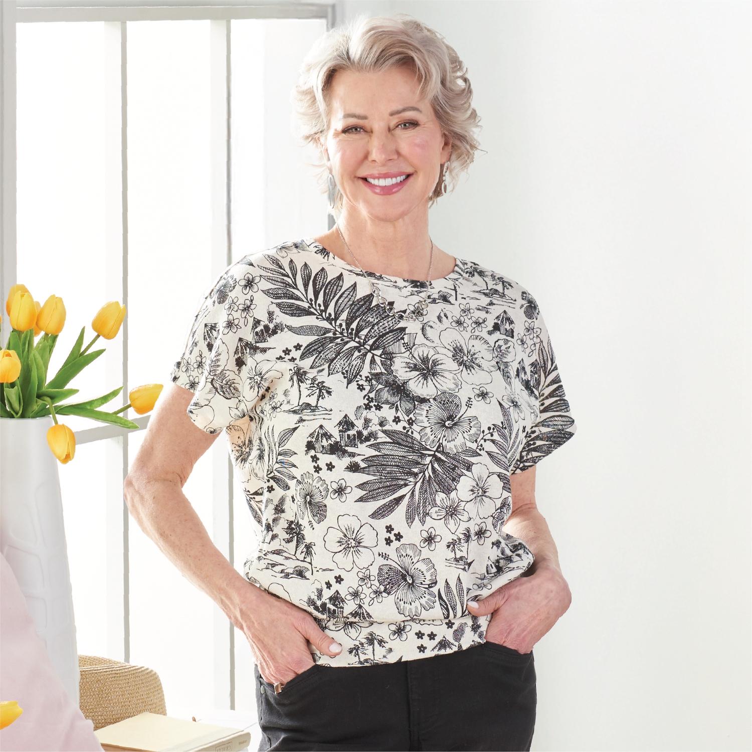 Featuring a white ruched hem top.