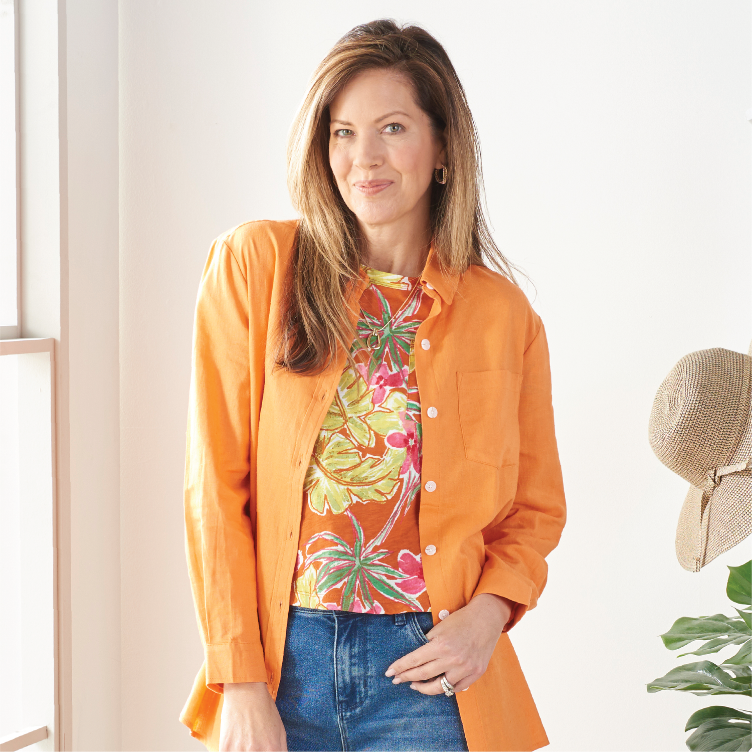 Featuring an orange linen blend shirt and orange tropical print tee.