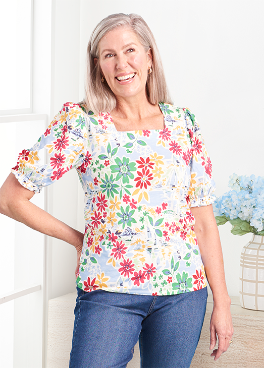 Limited Time! In-Store & Online: Hello, Sunshine! 25% Off New Summer Arrivals. Featuring a floral puff sleeve tee.