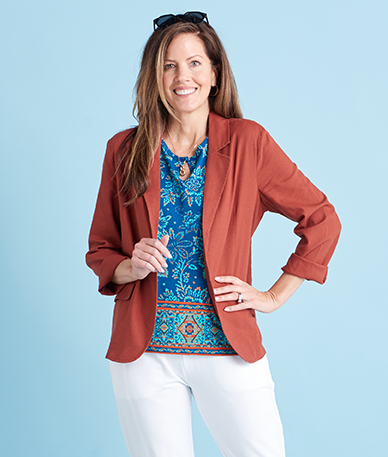 Featuring a brown blazer and blue border print top.