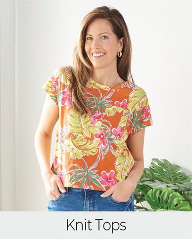 Explore our knit tops! Featuring a tropical print tee.
