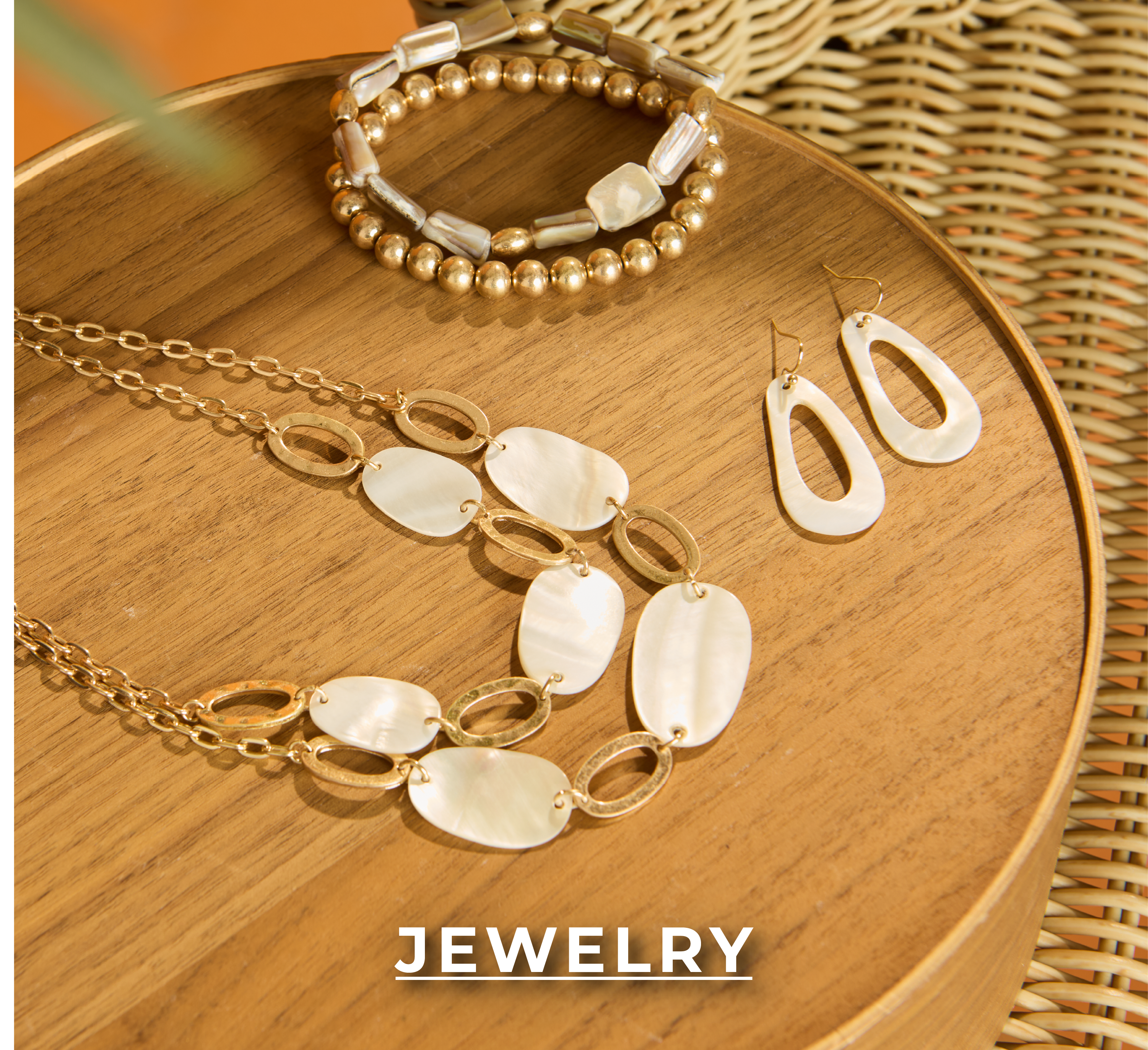 Jewelry. Explore our jewelry! Featuring a layer chain shell necklace, shell drop earrings, and multi stone stretch bracelet.