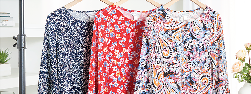 2 Days Only! Online Only: Select Tops Starting at $12.99*exclusions apply. Featuring a blue, red, and white ruffle top!