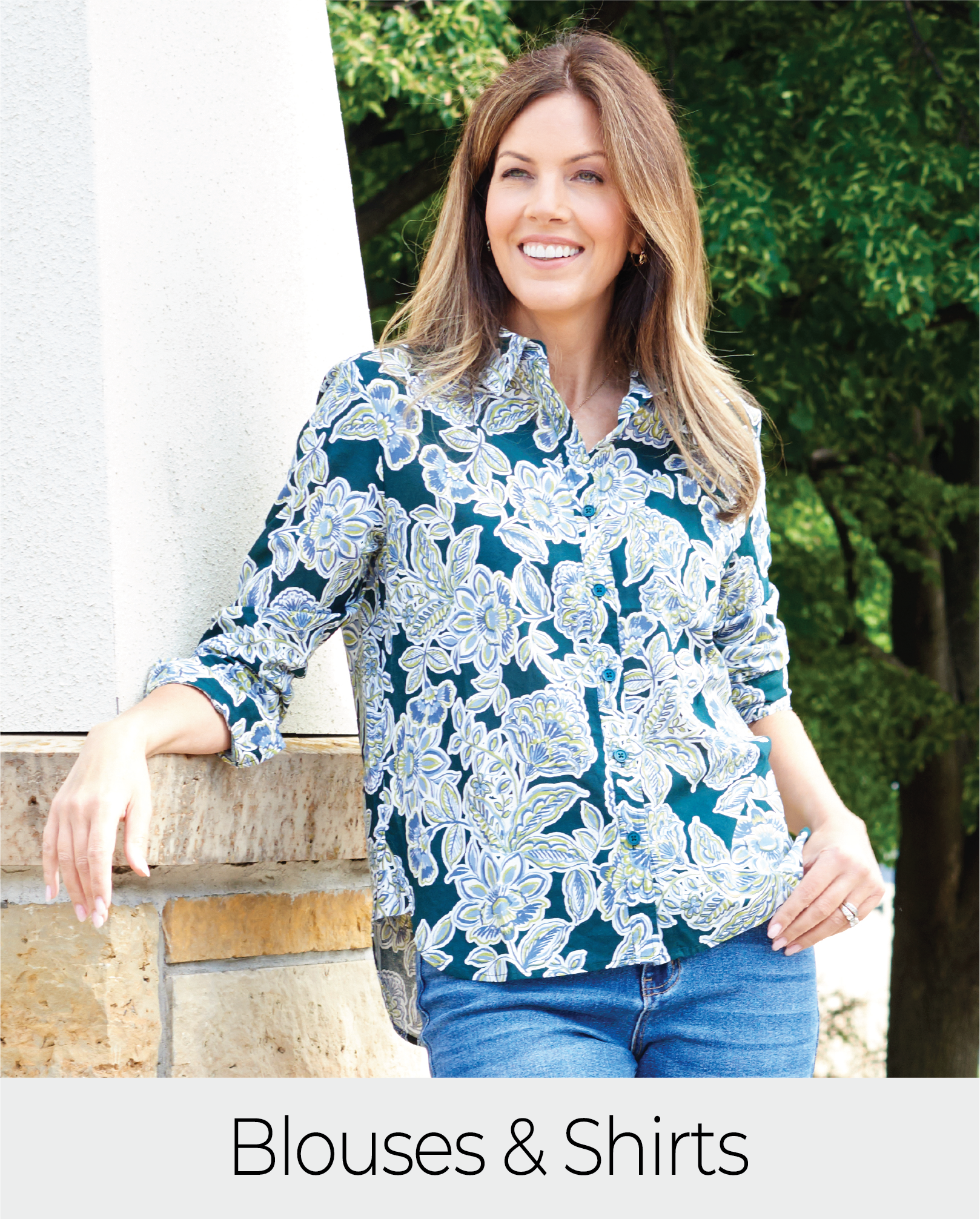 Explore our blouses and shirts! Featuring a blue floral button down shirt.