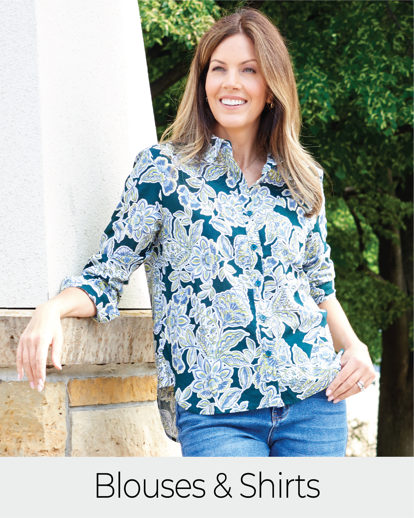 Explore our blouses and shirts! Featuring a blue floral button down shirt.