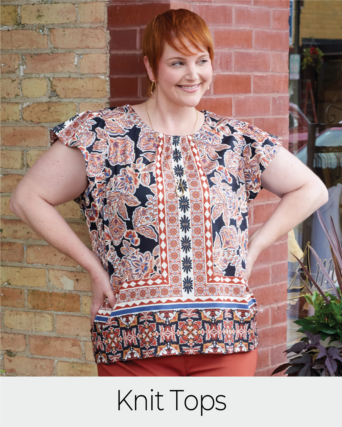 Explore our knit tops! Featuring a brown flutter sleeve top.