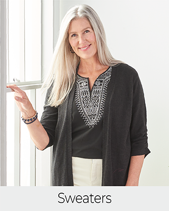 Explore our sweaters! Featuring a black cardigan.