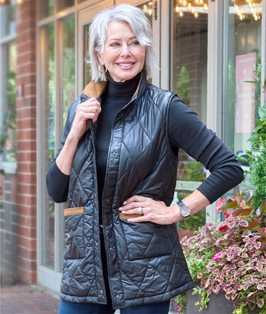 Explore our vests! Featuring a black vest.