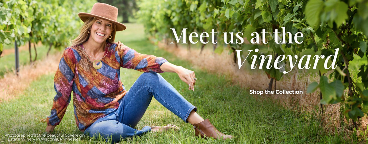 Meet us at the Vineyard. Shop the Collection. Photographed at the beautiful Sovereign Estate Winery in Waconia, Minnesota. Featuring a patchwork print peplum blouse and blue jeans.