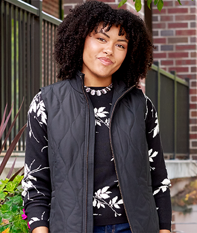 Explore our vests! Featuring a black quilted vest.