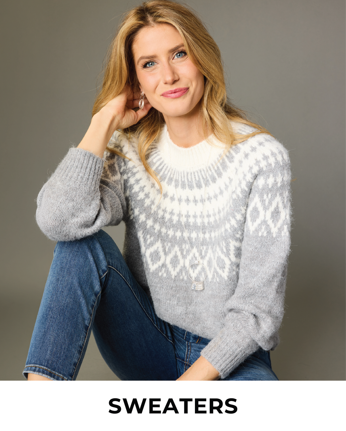 Explore our sweaters! Featuring a grey Fair Isle sweater.