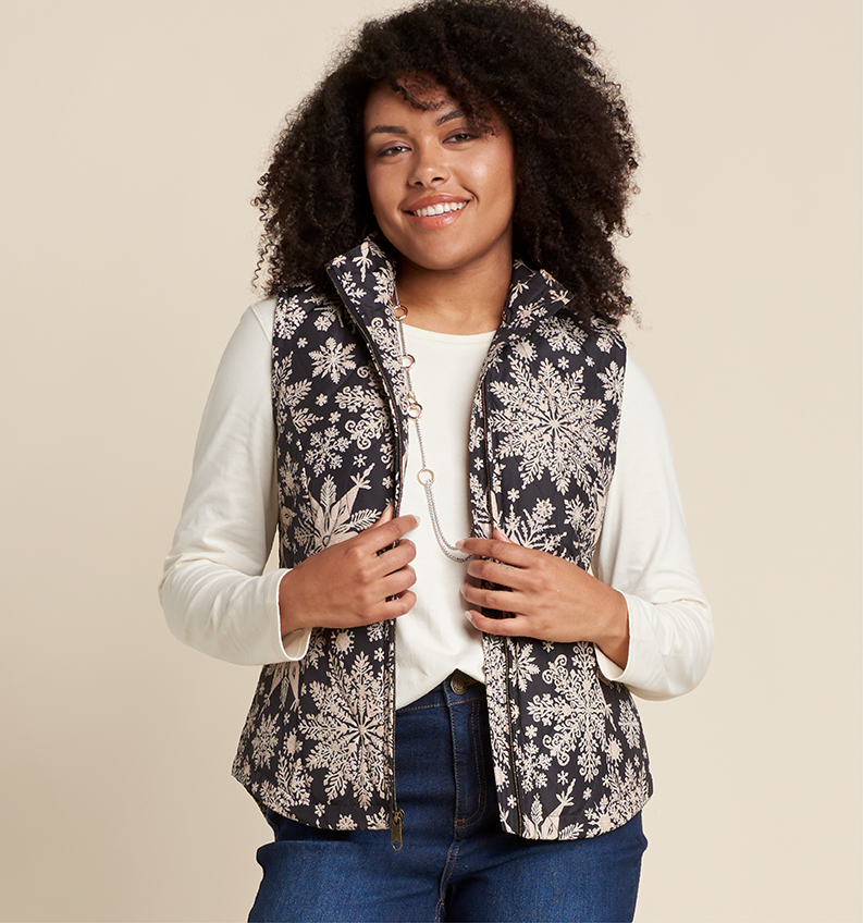 Featuring a white perfect tee and quilted snowflake vest!