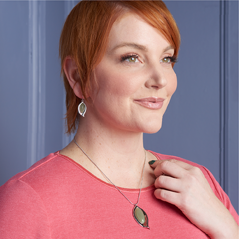 Finishing Touches. Featuring a beige pendant necklace!