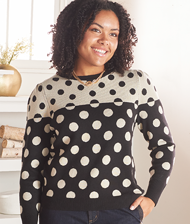 Explore our sweaters! Featuring a mixed polka dot sweater.