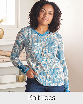 Explore our knit tops! Featuring a blue floral print tee.