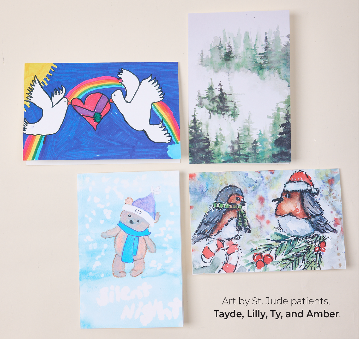 Featuring an assortment of St. Jude Patient Artwork Greeting Cards. Art by St. Jude patients, Tayde, Lilly, Ty, and Amber.
