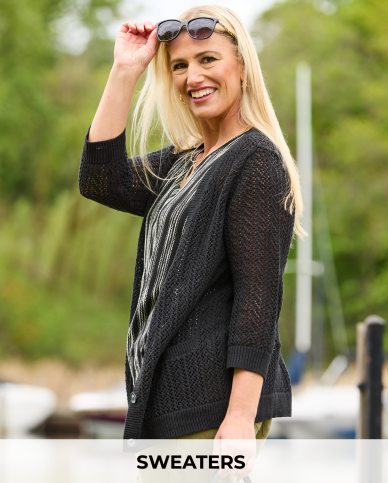 Explore our sweaters! Featuring a black open knit cardigan.