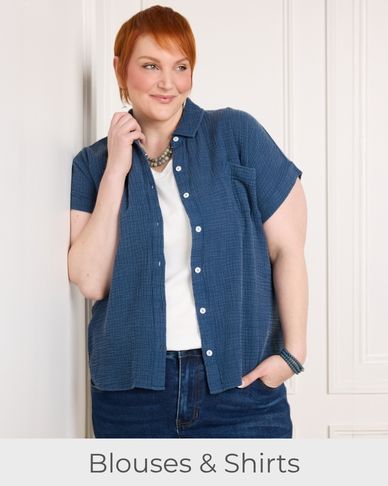 Explore our blouses & shirts! Featuring  a blue gauze button front shirt.