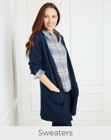 Explore our sweaters! Featuring a navy button cuff cardigan.