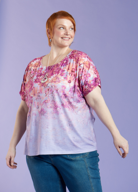 Explore our new arrivals! Featuring a purple embellished artistic floral print tee.
