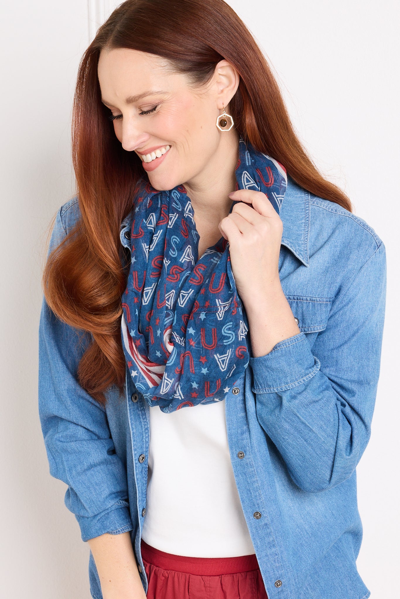 Explore our accessories! Featuring a blue infinity scarf.