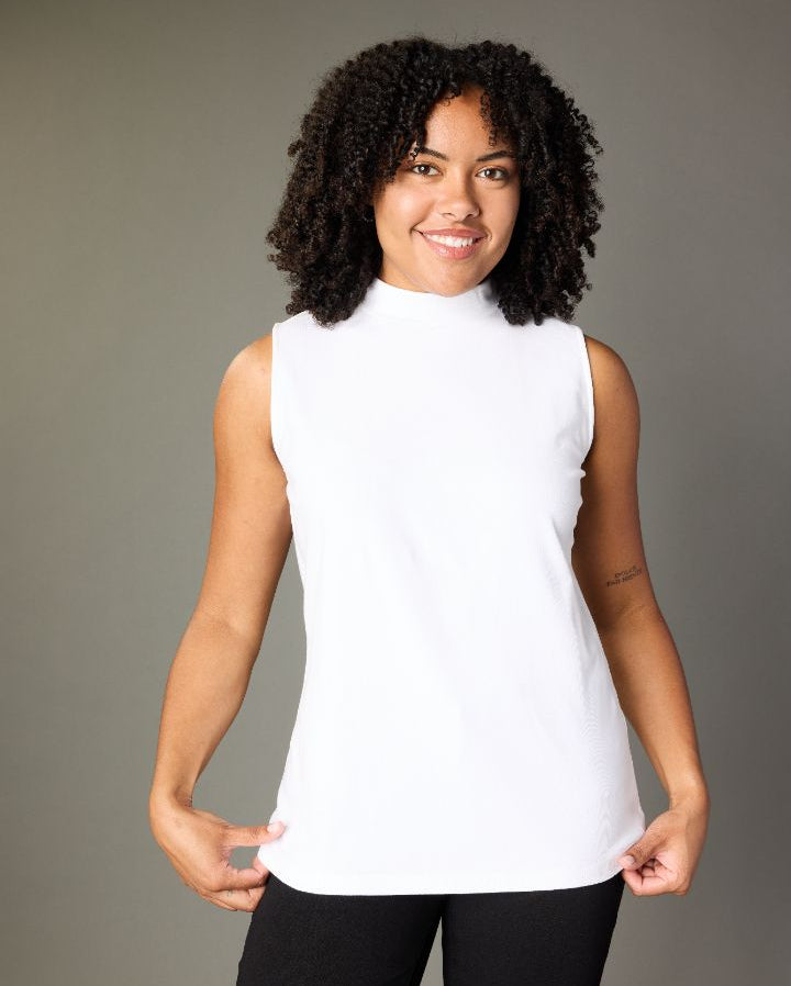 Explore our perfect tees! Featuring a white mock neck tank.