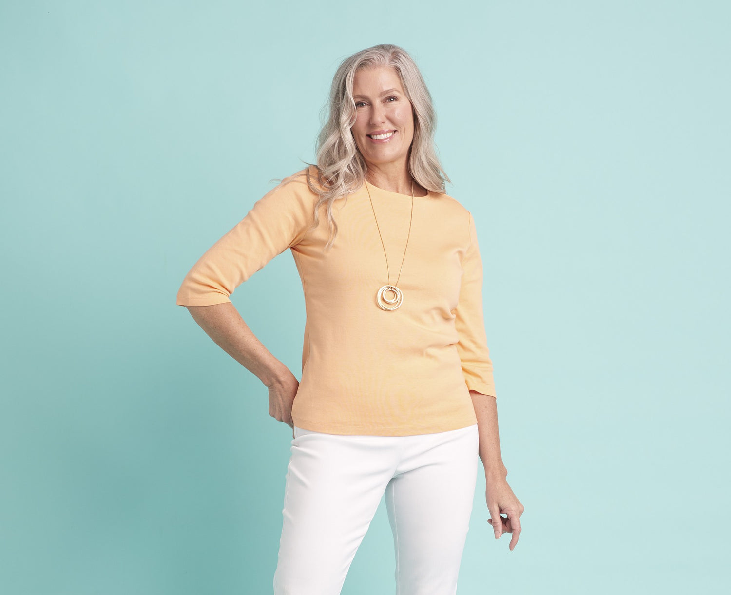 Explore our perfect tees! Featuring a yellow 3/4 sleeve crew neck tee.