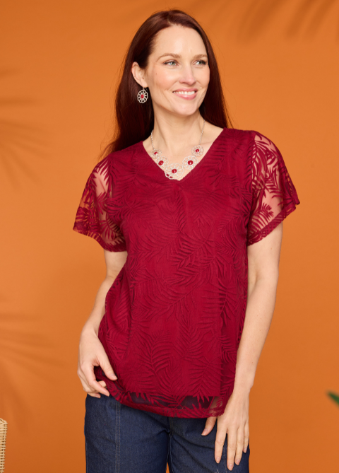 Explore our new arrivals! Featuring a red palm print top.